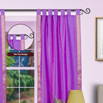 Lavender sari tab top curtains hung at a window