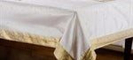 White sari tablecloth laid on a dining table