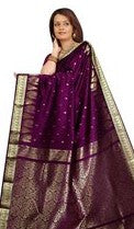 Magenta art silk sari shown draped on a model
