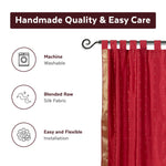 Fire brick sari tab top curtains hung at a window