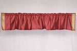 Maroon sari valance mounted above a window