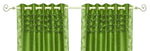 Forest green sari grommet top curtains hung at a window