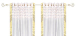 White sari grommet top curtains hung at a window