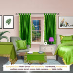 Forest green sari tab top curtains hung at a window