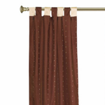Brown sari tab top curtains hung at a window