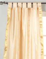 Misty rose sari tab top curtains hung at a window
