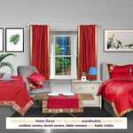 Maroon sari rod pocket curtains hung at a window