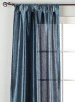 Navy blue sari tab top curtains hung at a window