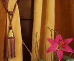Sari curtain tiebacks holding a panel open