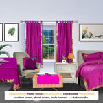 Violet sari tab top curtains hung at a window