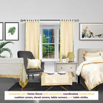 Cream sari tab top curtains hung at a window