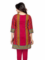 Pink sari kurti tunic shown draped on a model