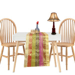 Art silk table runner running down a dining table