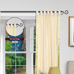 Cream sari tab top curtains hung at a window