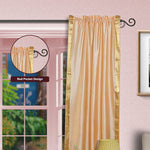 Gold sari rod pocket curtains hung at a window