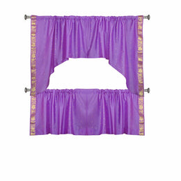 Lavender sari curtains hung at a window