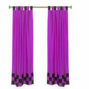 Lavender sari tab top curtains hung at a window
