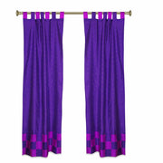 Lavender sari tab top curtains hung at a window