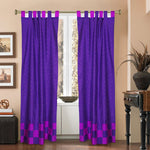 Lavender sari tab top curtains hung at a window