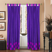 Lavender sari tab top curtains hung at a window