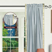 Gray sari rod pocket curtains hung at a window