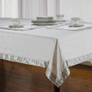 Silver sari tablecloth laid on a dining table