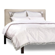 Silver sari duvet cover set made up on a bed
