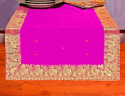 Violet silk table runner running down a dining table
