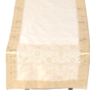 Cream silk table runner running down a dining table