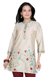 Golden sari kurti tunic shown draped on a model