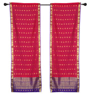 Sari rod pocket curtains hung at a window