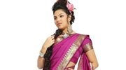 Violet art silk sari shown draped on a model