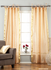 Misty rose sari tie top curtains hung at a window