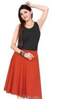Orange georgette pleated skirt shown draped on a model