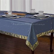 Gray sari tablecloth laid on a dining table