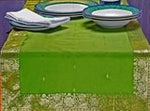 Forest green silk table runner running down a dining table