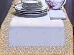 White silk table runner running down a dining table