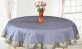 Gray sari tablecloth laid on a dining table