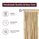 Golden sari tab top curtains hung at a window