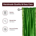 Forest green sari rod pocket curtains hung at a window
