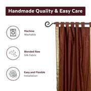 Brown sari tab top curtains hung at a window