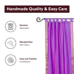 Lavender sari tab top curtains hung at a window