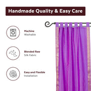 Lavender sari tab top curtains hung at a window