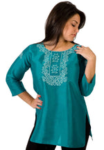 Turquoise art silk kurti tunic shown draped on a model