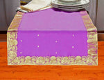 Calming lavender silk table runner running down a dining table