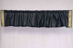 Black sari valance mounted above a window