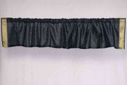 Black sari valance mounted above a window