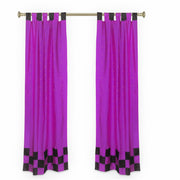 Lavender sari tab top curtains hung at a window