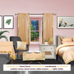 Gold sari rod pocket curtains hung at a window