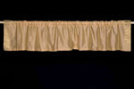 Golden rod sari valance mounted above a window